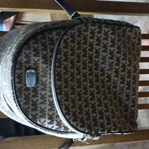 Michael Kors Backpack logo Pockets zippered Large Tan Brown Good Condition